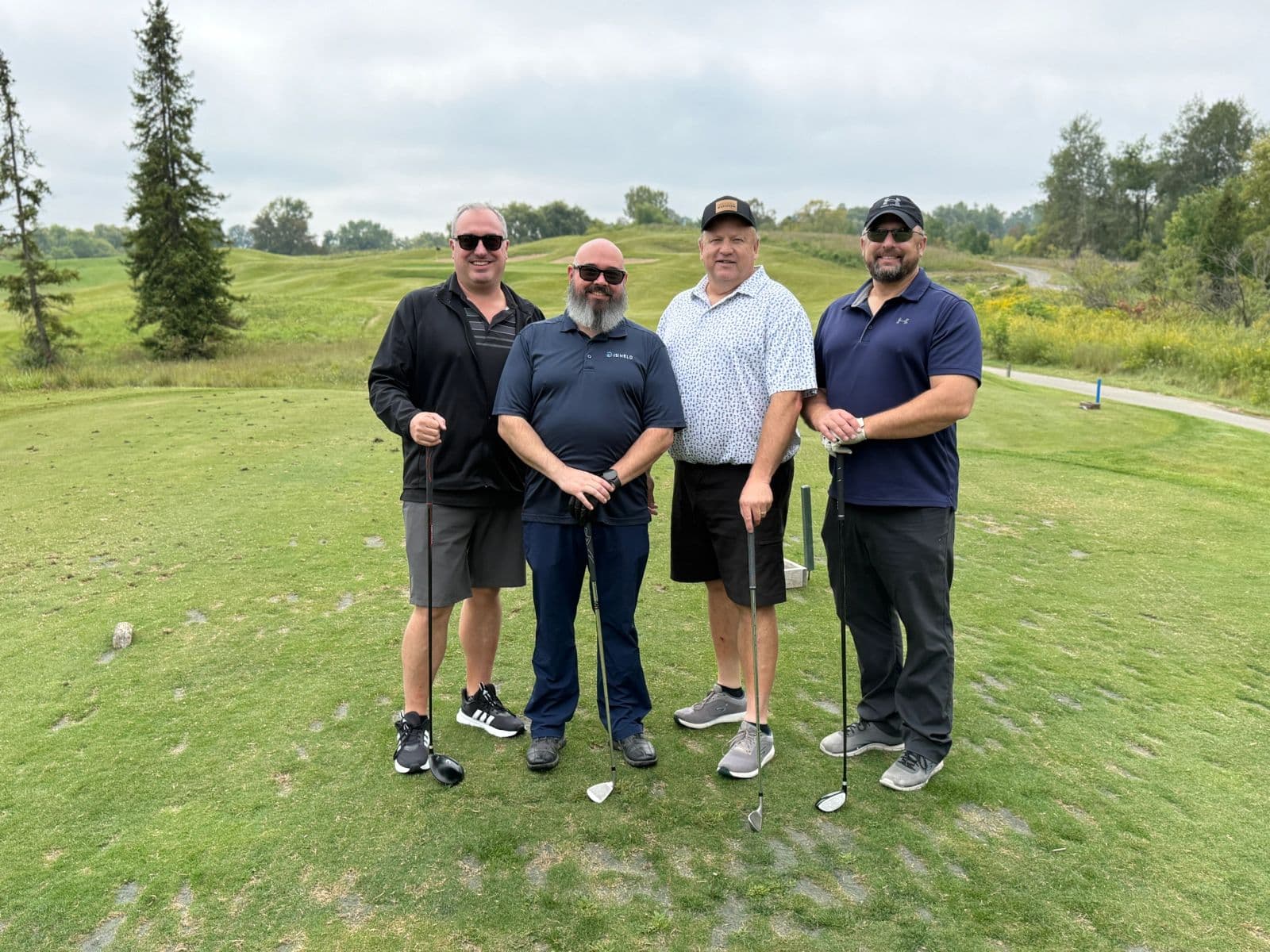 A foursome on the tee at the SEWI Claims golf outing